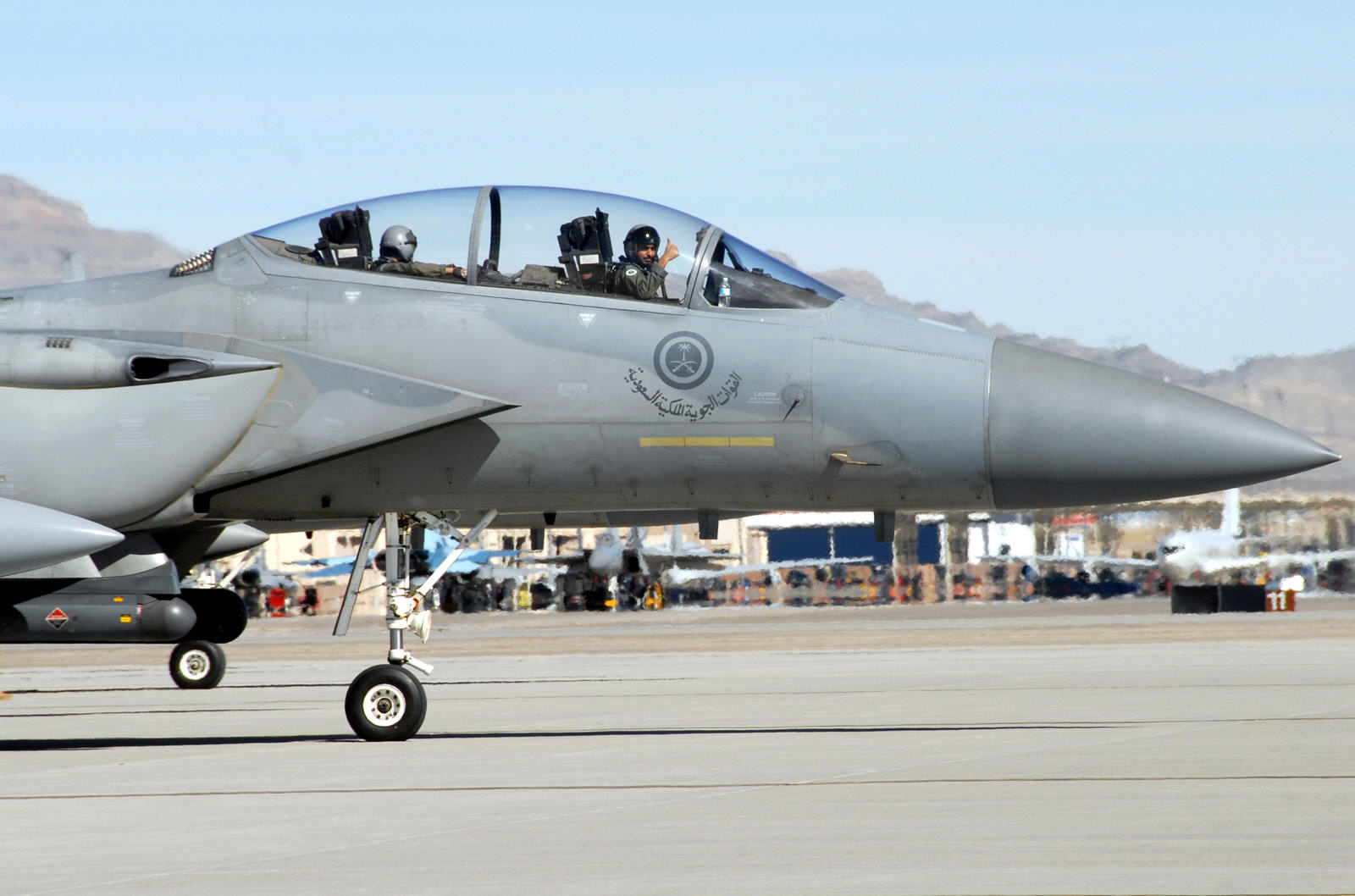 NELLIS AIR FORCE BASE, Nev. – A Royal Saudi air force pilot gives the thumbs-up as he taxis his F-15S to the runway for a Red Flag mission here Feb. 12. Red Flag is a multi-national exercise providing pilots with a realistic environment to practice combat scenarios. The experience gained during Red Flag is vital to the survival of pilots in combat. (U.S. Air Force photo by Chief Master Sgt. Gary Emery)